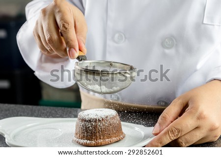 chef making lava chocolate cake in the kitchen