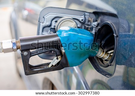 refilling the car with fuel