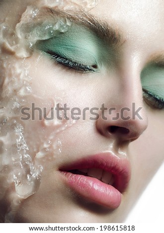 female young face closeup wet clean shiny skin, gentle make-up, mint shadows for centuries, green, water, fresh, delicate rich lips closeup with a shade of fuchsia