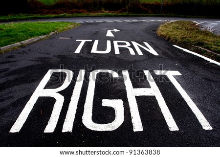 Turn right - a sign on a road instructing drivers to turn right at the junction