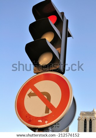 traffic light with no turn left sign
