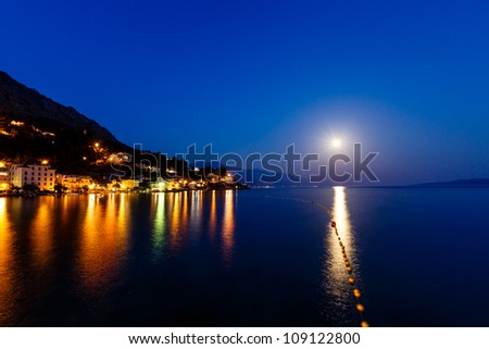 Small Dalmatian Village and Adriatic Sea Bay Illuminated by Moon, Croatia