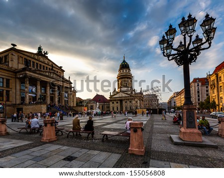 BERLIN, GERMANY - AUGUST 10: French Cathedral and Gendarmenmarkt Square on August 10, 2013 in Berlin, Germany. The square was created by Johann Arnold Nering at the end of the seventeenth century.