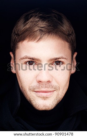 Rainy's 28th Hunger Games Characters Stock-photo-portrait-of-young-man-with-brown-eyes-on-a-black-background-90901478
