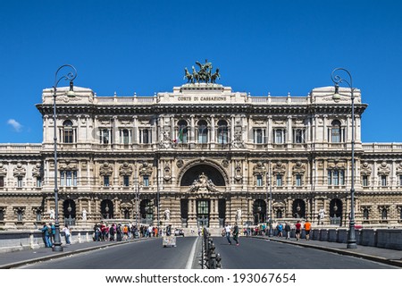 ROME - MAY 1, 2014: View of the building of the Supreme Court from the bridge Umberto on the feast of workers with some tourists who flock to the bridge- Rome, May 1st, 2014