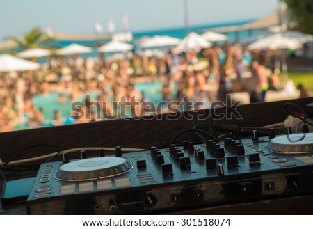 DJ mixer on pool party