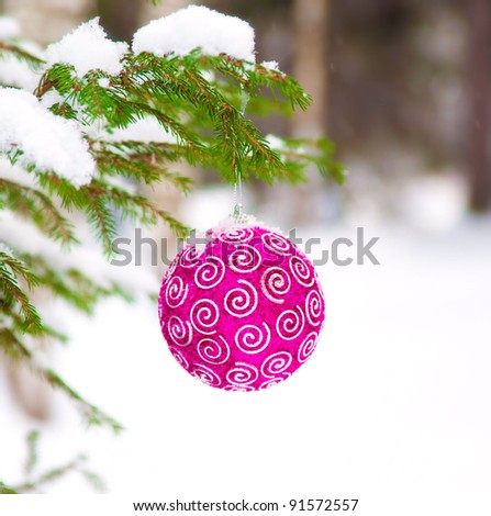 New Year\'s toy a ball on a snow fur-tree