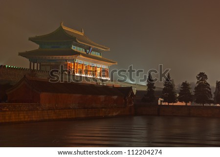 turret of the palace museum at night in beijing,China