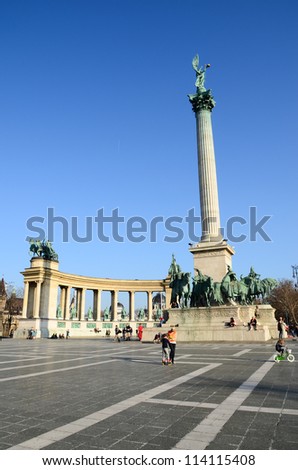BUDAPEST - MARCH 26: Tourists visit Millennium Monument in Heroes Square circa 26 March 2012 in Budapest, Hungary. This square has been UNESCO World Heritage site since 2002.