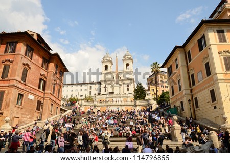 ROME - MARCH 25: Crowd sitting on the Spanish Steps on March 25, in Rome, Italy. With 138 steps in total, the Spanish Steps of Rome are the longest and widest outdoor steps in Europe.