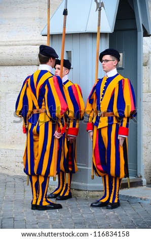 VATICAN - MARCH 26: Famous Swiss Guard on March 26, 2012 in Vatican. The Papal Guard with 110 men probably is the world\'s smallest army.