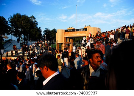 ATTARI, INDIA - MAY 1: Indian celebrating at the Indian - Pakistani border during the border closing ceremony at May 1, 2010 in Attari, Punjab, India.