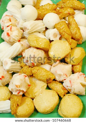 Asian dishes - variety of raw fish meat for steamboat set in shallow depth of field