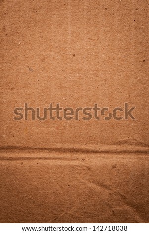 A close-up image of a cardboard texture background. Check out other textures in my portfolio.