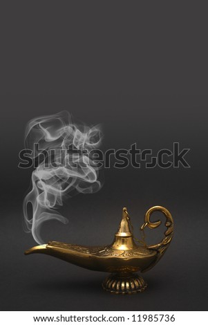 A magical genie lamp with smoke.