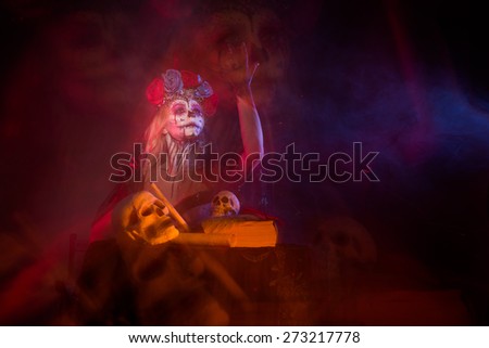 halloween make up sugar skull beautiful model with perfect hairstyle. Santa Muerte concept.
