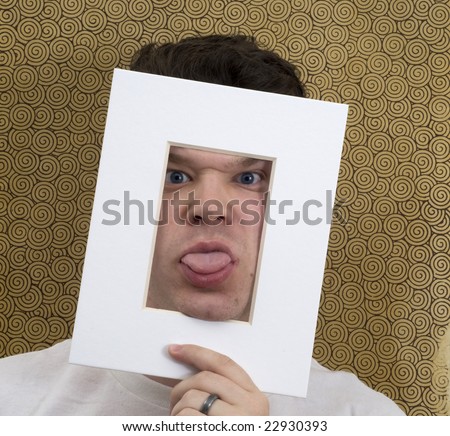 Ugly Face through Picture Frame