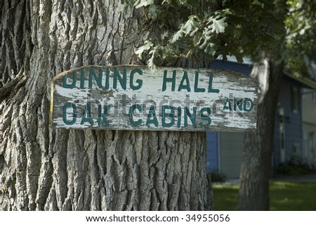 Dining Hall and Oak Cabins Sign