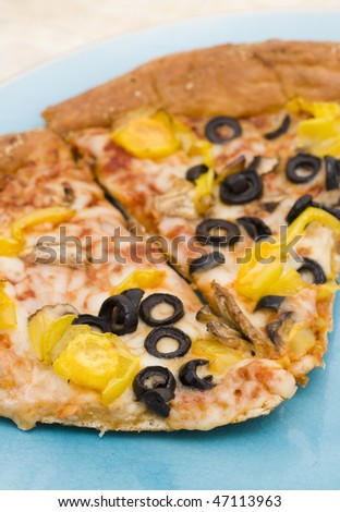 Pizza with Olive, Mushrooms and Banana Peppers.