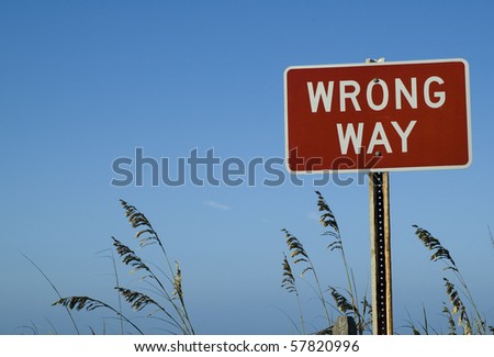 Wrong Way Sign at Beach.