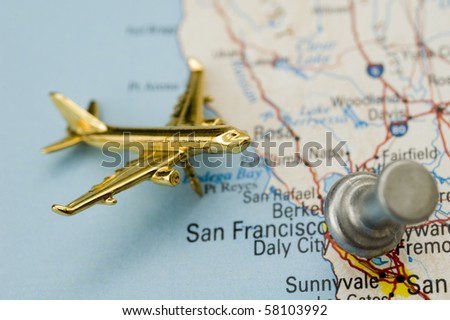 Thumbtack and Plane on Map of California. Map is Copyright Free Off a Government Website.