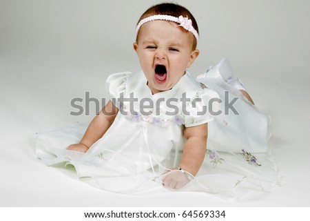 Cute Baby Yawning, Dressed up in Dress.