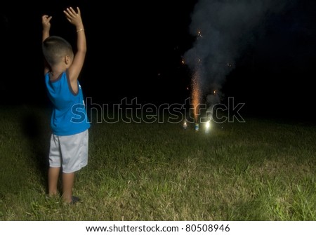 Boy Watching Fireworks Go Off.
