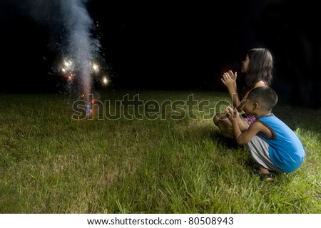 Kids Watching Fireworks Go Off.