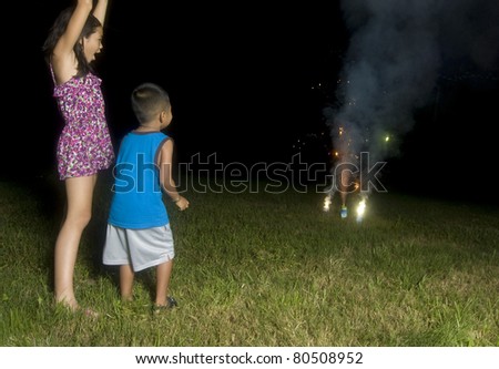 Kids Watching Fireworks Go Off.