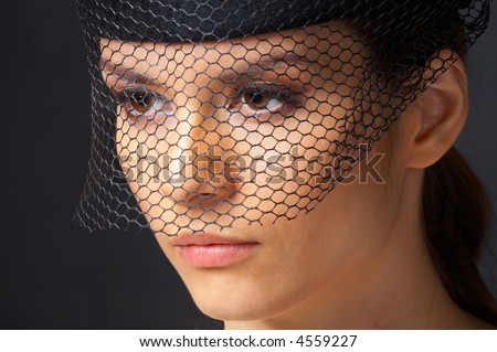 Mysterious woman with beautiful eyes