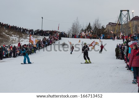Novosibirsk, Russia - December 7, 2013 :Adults and children awaiting the Olympic torch relay in Novosibirsk
