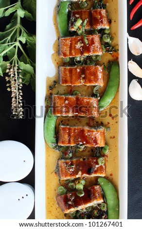 roast eel (unagi) with basil, Thai style fusion food