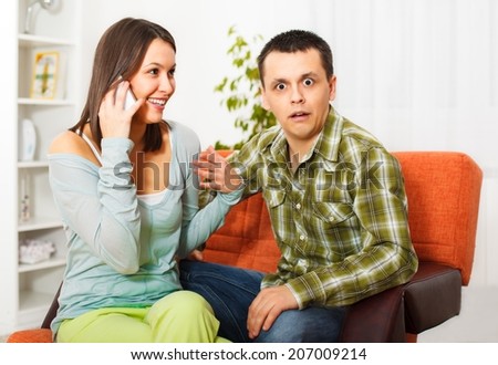 Young couple in the living room.