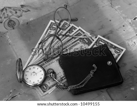 money, watch, eyeglasses and wallet on the vintage paper in black and white