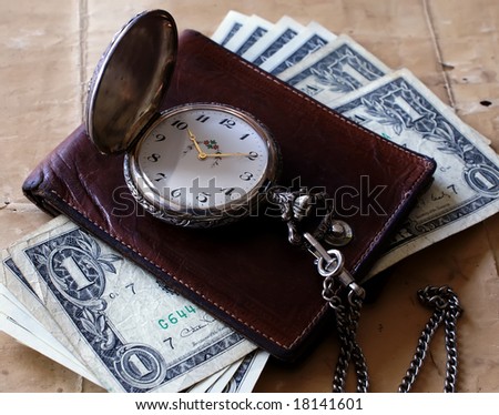 old watch, wallet and money