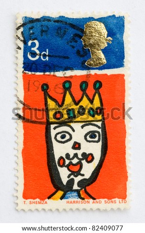 ENGLAND - CIRCA 1964 : A post stamp printed in England and shows children\'s drawing of Queen, result of a competition for school children to design a stamp for the festive season, circa 1964