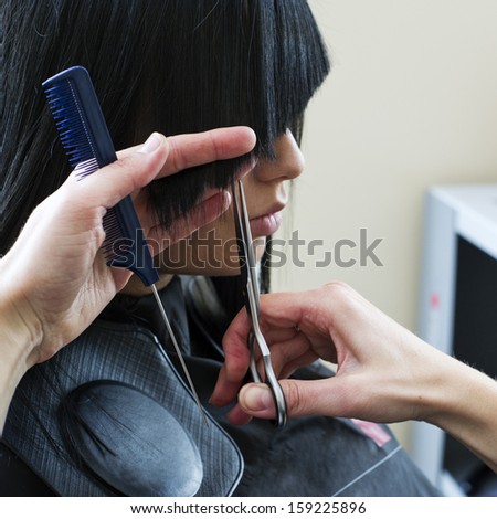 Woman in hairdressing salon do hair style.