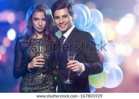 Couple Celebrating New Year\'S Eve With Champagne