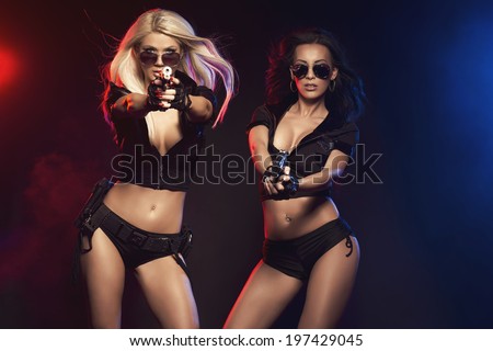 Two sexy woman like police woman