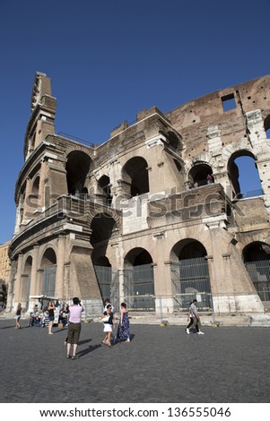 ROME - AUGUST 18: Tourist visit Coliseum, one of the most popular tourist attraction on August 18, 2012 in Rome.