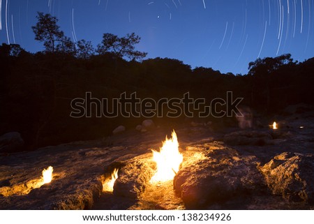 The fires of Yanartas  at night, Antalya, Turkey. small Fires which burn constantly from vents in the rocks on the side of the mountain.