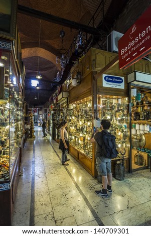ISTANBUL - TURKEY, MAY 24:People and tourists visit and shopping in Spice bazaar on May 24, 2013. Spirce Bazaar is in Fatih district of Istanbul, Turkey. It is asian style market and atracts visiters.