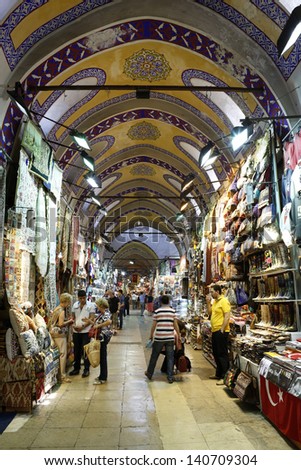 ISTANBUL - TURKEY, MAY 24:People and tourists visit and shopping in Spice bazaar on May 24, 2013. Spirce Bazaar is in Fatih district of Istanbul, Turkey. It is asian style market and atracts visiters.