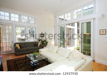 Open plan living room in modern condo apartment