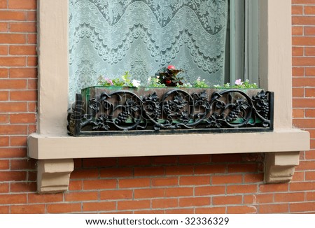 Window Box with floral pattern. Classic, elegant and simple wrought iron decoration
