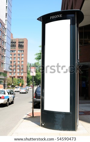 Tall commercial sign on telephone booth. Clipping path included.