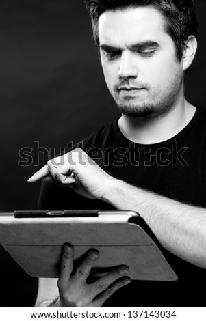 Man Playing With Tablet Pc.