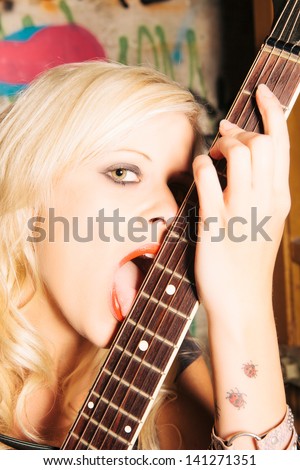 Rock N Roll Baby In Love With Her Guitar.