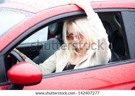 Photo Of Beautiful Woman With Sunglasses On A Rainy Day.