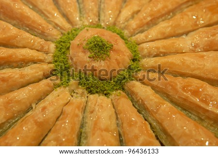 Baklava is a popular Middle Eastern pastry. This sweet is covered with honey, so it is shine.